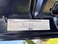 2014 Ford F-250 SD vehicle emission control information label with details on regulations and compliance