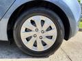 A close-up of a silver alloy wheel with a Continental tire on a 2018 Kia Rio5