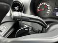 Close-up of a 2021 Mercedes-Benz Sprinter's steering column with controls for windshield wipers and indicators visible