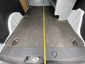 Interior view of a 2017 Ford Transit Connect showing a clean, flat cargo area with a measurement tape positioned along the centerline