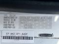 A label from a 2012 Freightliner M2 112 truck displaying manufacturing details including vehicle ID, manufacturer, and vehicle specifications