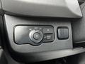 The control panel of a 2019 Mercedes-Benz Sprinter featuring a dial for light settings and buttons for various functions