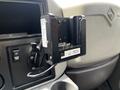 A mounted device inside a vehicle's cabin designed for electronic data exchange and connectivity