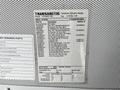 2022 Blue Bird Vision bus with a detailed service label showing part numbers and descriptions related to its maintenance and specifications