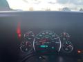 Dashboard of a 2017 Chevrolet Express displaying speedometer and various gauges for fuel temperature and oil pressure