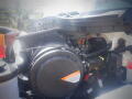 A 2016 International WorkStar 7500 truck engine with various components including hoses wires and a large air intake system