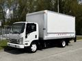 A 2016 Isuzu NQR truck with a white box cargo area and a clean front design parked on a concrete surface