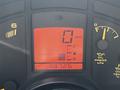 Dashboard display of a 1992 Chevrolet Corvette showing speedometer, fuel gauge, and odometer reading 38726 miles