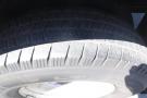Close-up of a tire from a 2012 Mercedes-Benz Sprinter showing tread patterns and sidewall details