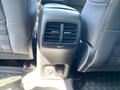 The interior console of a 2023 Ford Bronco Sport featuring air vents and controls for rear passengers
