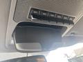 A set of auxiliary switches mounted on the interior overhead console of a 2017 Ford F-550