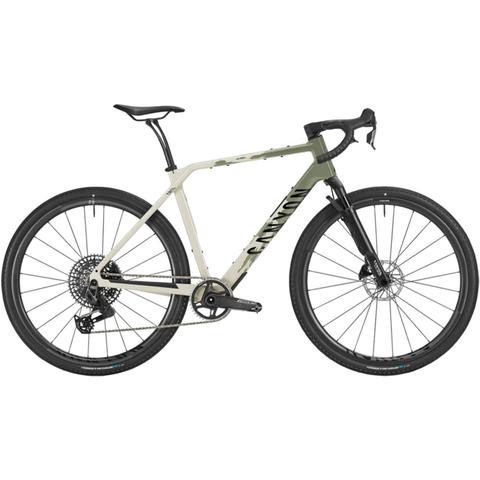 2026 Canyon Grizl CF 9 ESC gravel bike features a lightweight carbon frame with a green and cream color scheme disc brakes and wide tires for adventure cycling