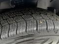 Close-up of a tire tread showing detailed patterns and grooves on a 2019 Mercedes-Benz Sprinter tire