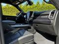 A 2022 RAM 3500 interior featuring a leather seat, a central touchscreen display, and a modern dashboard design