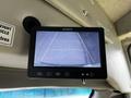 A rearview camera display showing guide lines for parking assistance in a 2016 Ford Econoline