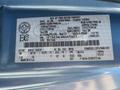 A 2008 Ford E-350 vehicle identification sticker displaying manufacturing details and specifications