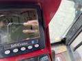 Close-up of the dashboard of a 2012 Toro Groundsmaster 5910 displaying operating hours with gauges for fuel and engine temperature