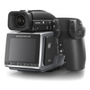 Hasselblad H6D-100c Medium Format DSLR Camera featuring a large display screen and a textured grip with controls on the side and top