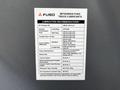 2015 Mitsubishi Fuso FE with a lubrication recommendations label detailing oil types and maintenance instructions