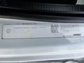 A 2010 Freightliner M2 106 vehicle identification label displaying vehicle details and manufacturing information