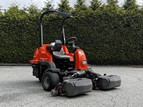 A 2015 Jacobsen Eclipse golf course mower with a compact design featuring a seat, steering controls, and two cutting decks at the front