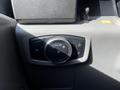 A control panel featuring a dial for adjusting headlights and interior lighting in a 2018 Ford F-550