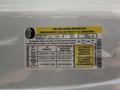 A tire information sticker for a 2014 Ford F-150 detailing seating capacity and tire pressure specifications