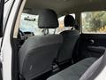 Interior view of a 2012 Nissan Versa showing the back seats and headrests