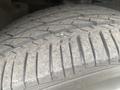 Close-up of the tire tread of a 2018 Buick Encore showing detailed grooves and texture indicating wear and depth of the tire