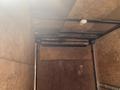 A 2020 Stealth Enterprises Trailer with a metallic frame and wooden interior panels visible inside the trailer