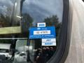 A blue British Columbia vehicle registration sticker displaying the year 2025 and the words Certificate of Approval along with a license plate number and the month July