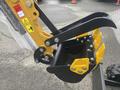 2024 AGT Industrial H13R Mini Excavator featuring a yellow and black bucket attachment with sharp edges and heavy-duty components for digging and handling materials