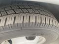 Close-up of a tire on a 2017 Chevrolet Express showing detailed tread patterns and sidewall design