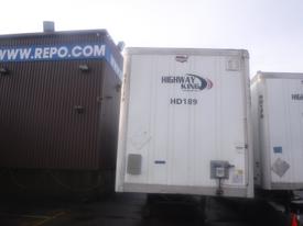 A 2023 Wabash International Floor trailer with a white exterior displaying the logo of Highway King and the identification number HD189