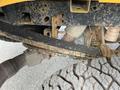 Close-up view of the underside of a 2017 Ford F-250 SD showing rusty components including the axle and exhaust system with visible tire tread