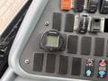 A black Webasto control unit sits on a panel with several switches and buttons including light controls and an ignition switch