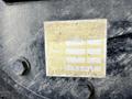 A close-up of a faded inspection sticker attached to a metal surface with fields for date paint and weight on a 2013 K-Line 16 Foot Steel Tandem Pony 17 Ton Dump Trailer with Air Weigh