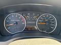 Dashboard of a 2011 Chevrolet Colorado featuring the speedometer tachometer and various warning lights along with an odometer displaying 88125 kilometers