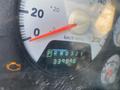 Close-up of the dashboard of a 2009 Dodge Ram 5500 with speedometer and gear indicator showing P R N D 3 2 1 and odometer reading 339898