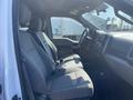 Interior view of a 2017 Ford F-150 showcasing two front seats with gray upholstery and a dashboard visible in the front