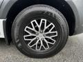 Close-up of a alloy wheel on a 2019 Mercedes-Benz Sprinter featuring a five-spoke design with a black and silver finish and mounted on a Kumho Crugen tire