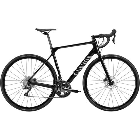 2026 Canyon Endurace CF 6 Carbon Endurance Road Bike featuring a sleek black frame and disc brakes designed for endurance cycling