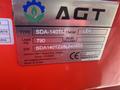 Label of a 2025 AGT Industrial SDA-140T(Z) featuring details on type load width and serial number displayed on a red background