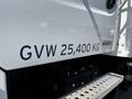A 2012 Freightliner M2 112 truck displaying the text GVW 25,400 KG on its side indicating the gross vehicle weight rating