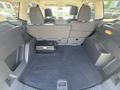 Interior view of the cargo space of a 2014 Ford Escape with a flat floor and no visible items in the trunk area
