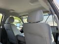 Interior view of a 2015 Ford F-550 showing the backs of two front seats and the cabin layout