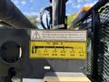 2012 Ford F-450 Super Duty with a large towing attachment and control labels for operating levers and weight capacities