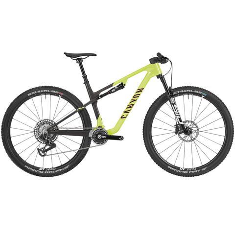 2025 Canyon Lux World Cup CFR AXS Mountain Bike features a sleek black and bright yellow frame with large wheels and a modern design for trail riding