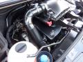 A 2016 Mercedes-Benz Sprinter engine bay showcasing various components including a black air intake hose and an exposed battery terminal