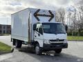 A white 2014 Hino 195 box truck is parked with its cab facing forward and a blank rear cargo area visible